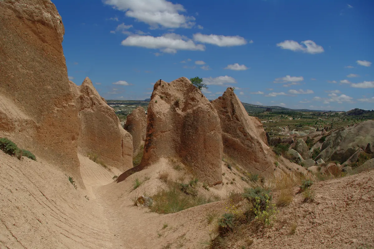 Dirt track through the rock formations of Rose Valley, used for ATV tours